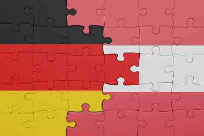 österreichische und deutsch Fahne - © luzitanija - stock.adobe.com